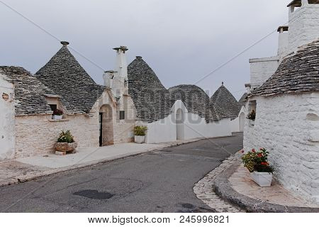 Unique Small South Italia City Alberobello With Antient Stones Conical Houses Trullo, Tourist Destin