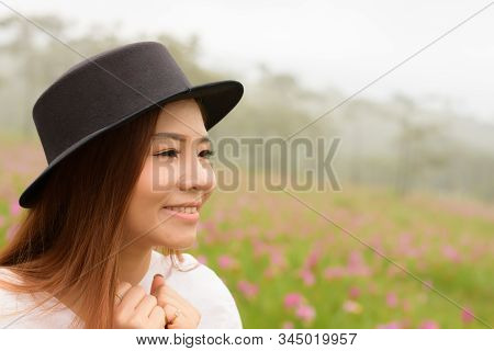 Portrait Of A Woman Relaxing In The Garden Siam Tulip