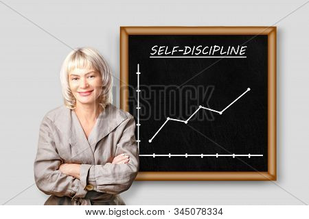 Smiling Woman Standing Near Board With Text, Self Discipline And Growth Chart. Discipline And Self M