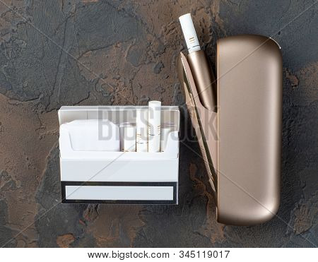 New Heat-not-burn Tobacco Heating System On Dark Background