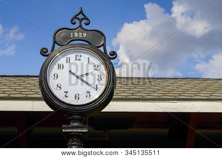 Antique Clock. Large Antique Clock At A Train Station.