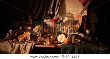 Still Life In Old Masters Style With Lobster, Glass Of Wine, Silver Dishes, Fruits, Guitar Lute And 