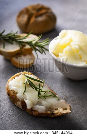 Lard - Delicacy Made Of Pig Fat. Lard In A Bowl And Smeared On The Sandwiches Made Of Crispy Bread R