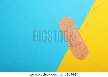Sticking Plaster On Color Background, Top View. Space For Text