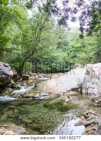 Throat Of The Muga River. Stream Of The Muga River, In The Throat Of Its Name, In The Pre-pyrenees A