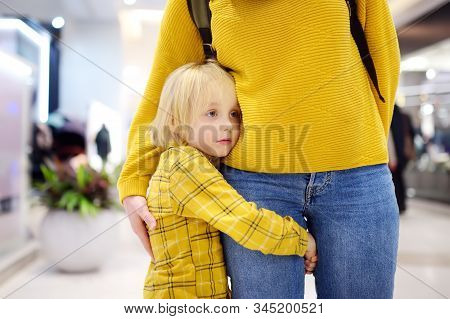 Little Boy Embrased His Mother. Shyness, Fears, Anxiety. Hyper-attachment To Mother.
