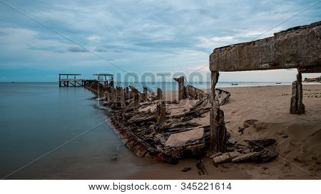 Dilapidated Old Fishing Dock Collapsing Into The Sea In Pak Nam Pran On The Gulf Of Thailand In Thai