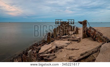 Dilapidated Old Fishing Dock Collapsing Into The Sea In Pak Nam Pran On The Gulf Of Thailand In Thai