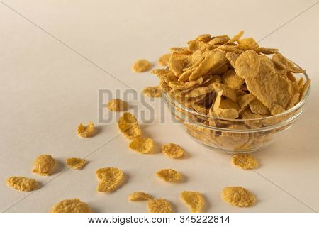 Cornflakes In A Plate On A Light Background. Selective Focus