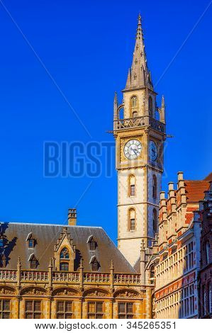 Ghent, Belgium, Former Building Of Post Office, Oude Postkantoor, With Clock Tower On Korenmarkt