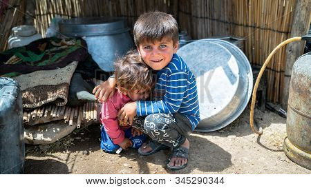 Shiraz, Iran - May 2019: Qashqai Turkish Nomadic Children Inside A Tent. The Qasqhai Are Nomadic Peo