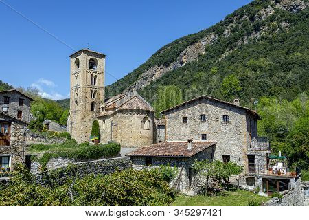 View Of The Bell Tower And The Apse Of The Romanesque Church Of Beget, Spain