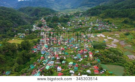 The Town Is Surrounded By Mountains, A Top View. Sagada City On Luzon Island, Philippines. Houses An
