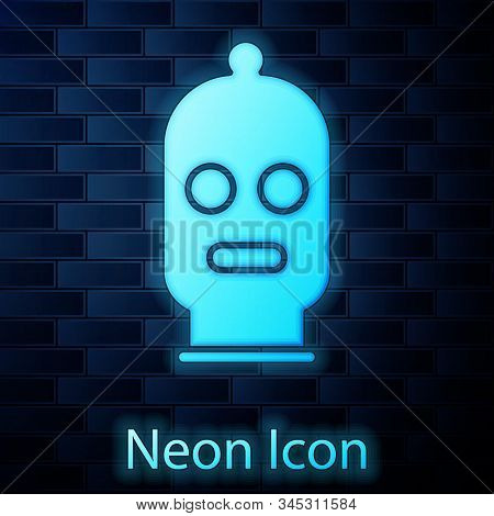 Glowing Neon Balaclava Icon Isolated On Brick Wall Background. A Piece Of Clothing For Winter Sports