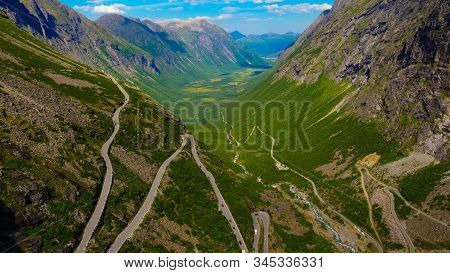 Trolls Path Trollstigen Winding Scenic Mountain Road With Many Cars, Norway Europe. National Tourist