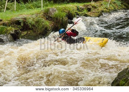 Frongoch Wales Uk - September 18 2016: Kayaker Paddling The Rapids At The National White Water Centr