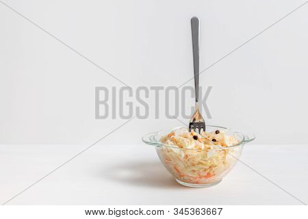 Homemade Sauerkraut. Fermented Food. Sauerkraut With Carrots In Glass Bowl With Fork On Wooden White