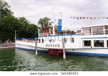 Inning Am Ammersee, Germany - July 6 2019: Paddle Steamer Diessen Floating By Pier On The Lake Ammer
