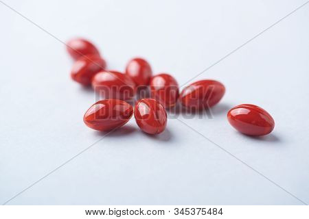 Beta-carotene Tablets. Antioxidants. Concept For A Healthy Dietary Supplementation. Bright Paper Bac
