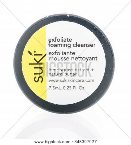 Winneconne, Wi - 24 December 2019 : A Package Of Suki Exfoliate Foaming Cleanser On An Isolated Back