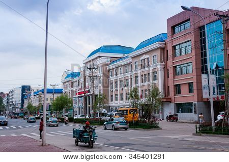 China, Heihe, July 2019: Administrative Building, Streets Of The Chinese City Of Heihe In The Summer