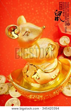 Tradition Chinese golden rat statue, ,rightside Chinese characters mean year of the rat,and wording mean:Chinese calendar for the year.