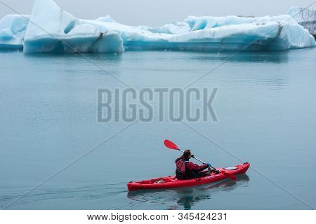 Man Paddling In A Kayak, Jokulsarlon, Iceland