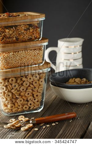 Breakfast Cereal. Glass Boxes With Granola, Cereal Rings And Quinoa Pops. Cereal Loops In A Bowl. He