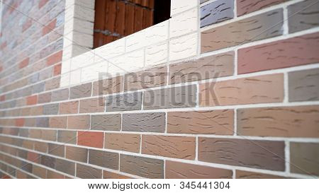 Facade Of A Brick House. Windowless Brick Building
