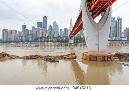 Chongqing, China - June 12, 2019 : Dongshuimen Bridge Above Yangtze River In Daylight With Yuzong Pe