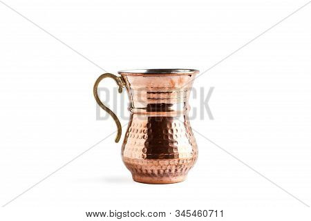 A Turkish Coffee Maker On A White Background