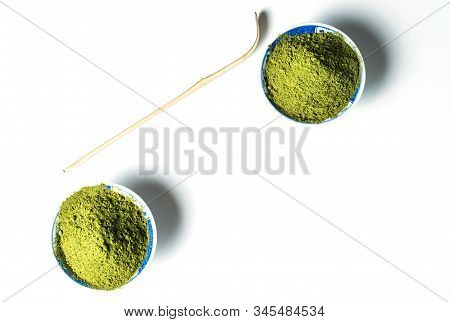 Matcha Green Tea Powder In Bowls Isolated On White Background.