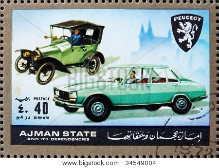 Frimärke Ajman 1972 Peugeot, bilar då och nu