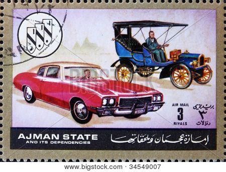 Frimärke Ajman 1972 Chevrolet, bilar då och nu