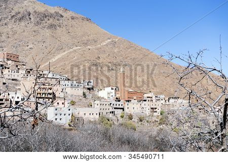 Berber Village With Mosque Located High In Atlas Mountains, Morocco