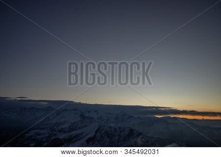A Beautiful View Of A Sunrise And Himalayan Mountain Range From The Summit Of A Himalayan Mountain