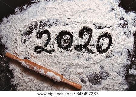Numbers 2020 Samples In Words Paint On Flour Table And Rolling Pin Diagonally Lower Left