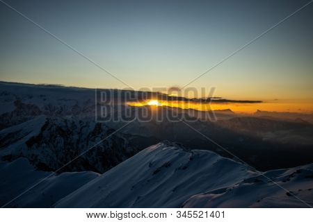 A Beautiful View Of A Sunrise And Snow Capped Mountains In Himalaya From The Summit Of A Himalayan M