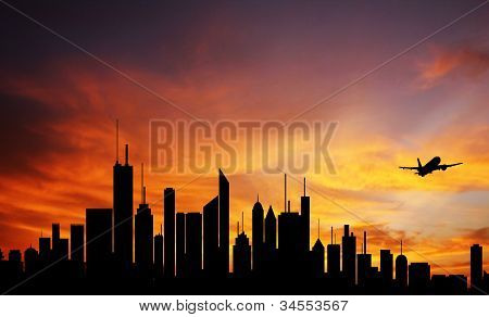 Konceptuelle foto af City Downtown på solopgang/solnedgang med Skyline Silhouette mod en smuk Oran