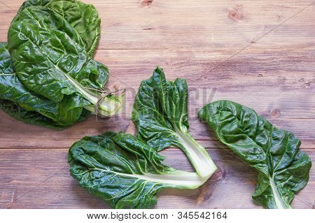 Balkan Cuisine. Blitva ( Chard Leaves ) - Popular Leafy Vegetables. Rustic Background, Free Space Fo