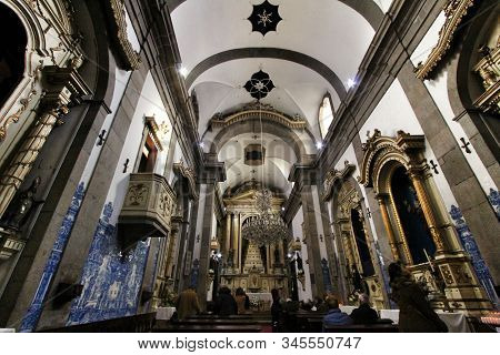 Oporto, Portugal- January 2, 2020: People Visiting The Beautiful Interior Of Capela Das Almas Church