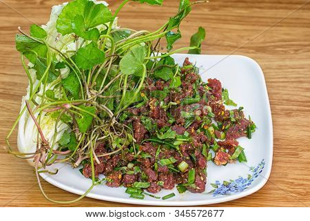Laab. Thai Spicy Minced Meat Salad On Table