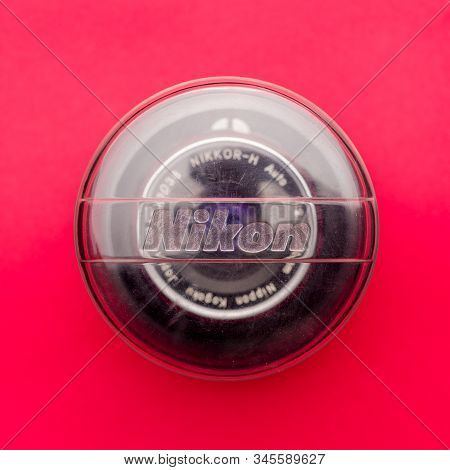 Tula, Russia - 16 December 2019: Vintage Nikon Lens On Red Background - Image