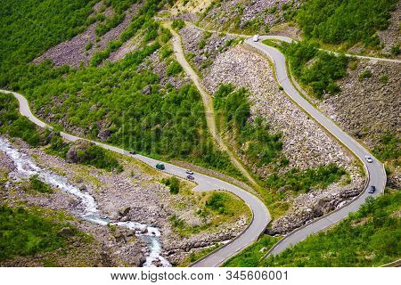 Trolls Path Trollstigen Winding Scenic Mountain Road With Cars, Norway Europe. National Tourist Rout