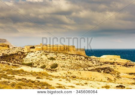 Castle San Ramon Above Beach Of El Playazo, Cabo De Gata Nijar, Province Almer