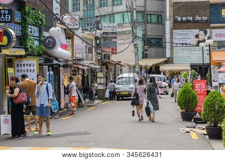 Seoul, South Korea - June 15, 2018: Crowed Tourist And Visitor At Ewha Shopping Street, The Famous S