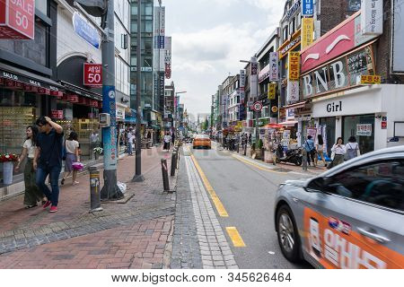 Seoul, South Korea - June 15, 2018: Crowed Tourist And Visitor At Ewha Shopping Street, The Famous S