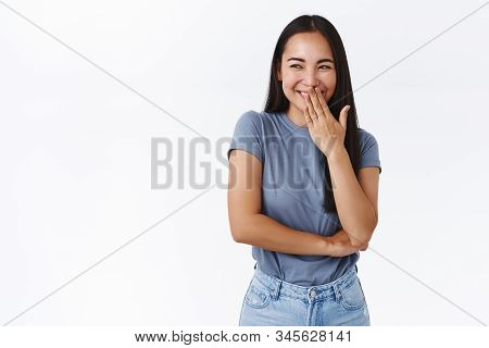 Silly Hideous Female Asian College Student Making Prank And Giggle In Corner As Watching Someone Got