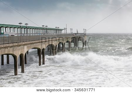 Breakers Coming In On Boscombe Pier, Bournemouth In Dorset