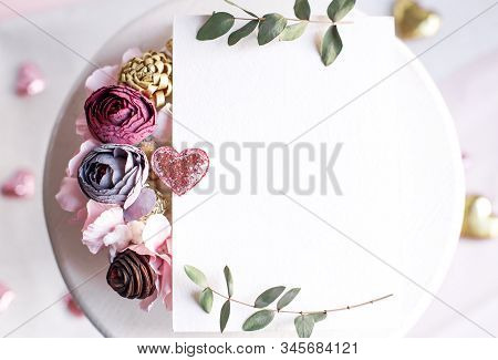 Background With Copy Space Blank On White Table With Glitter Heart, Eucalyptus Branch, Flowers And L